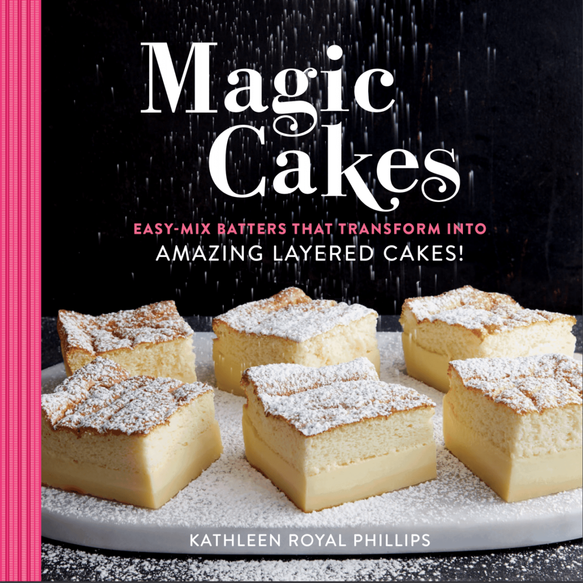 Cover of Magic Cakes cookbook with squares of powdered sugar dusted custard cakes