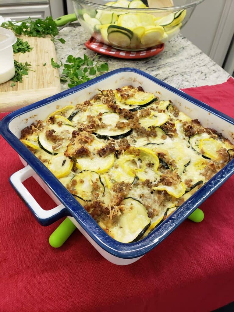 Sausage Squash Casserole with silicon trivet foldable