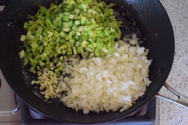 celery onion garlic in nonstick skillet on stovetop