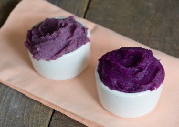 Bowls of purple sweet potato puree and hydrated purple ube powder