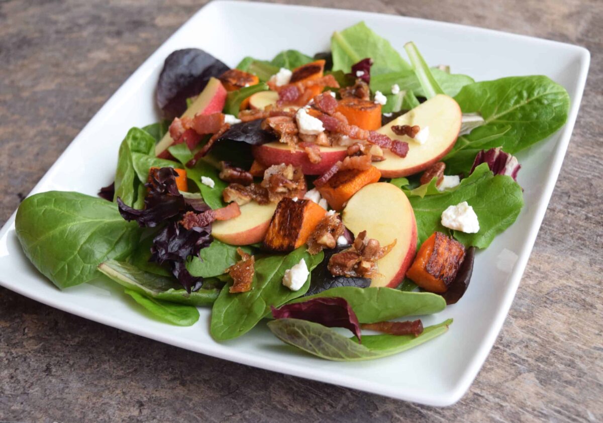Apple and Roasted Butternut Squash Salad on a white plate