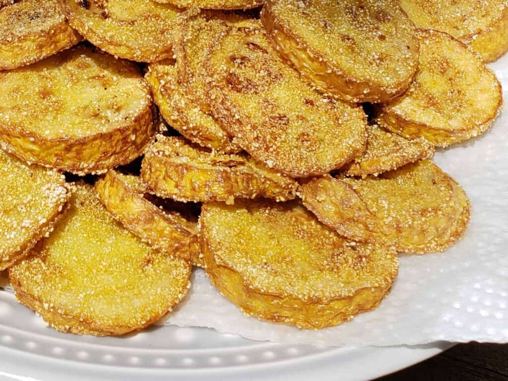 Fried Yellow Squash draining on paper towels Close up