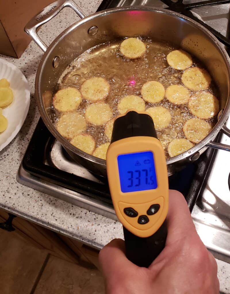 Thermal thermometer registering 337 degrees over hot oil
