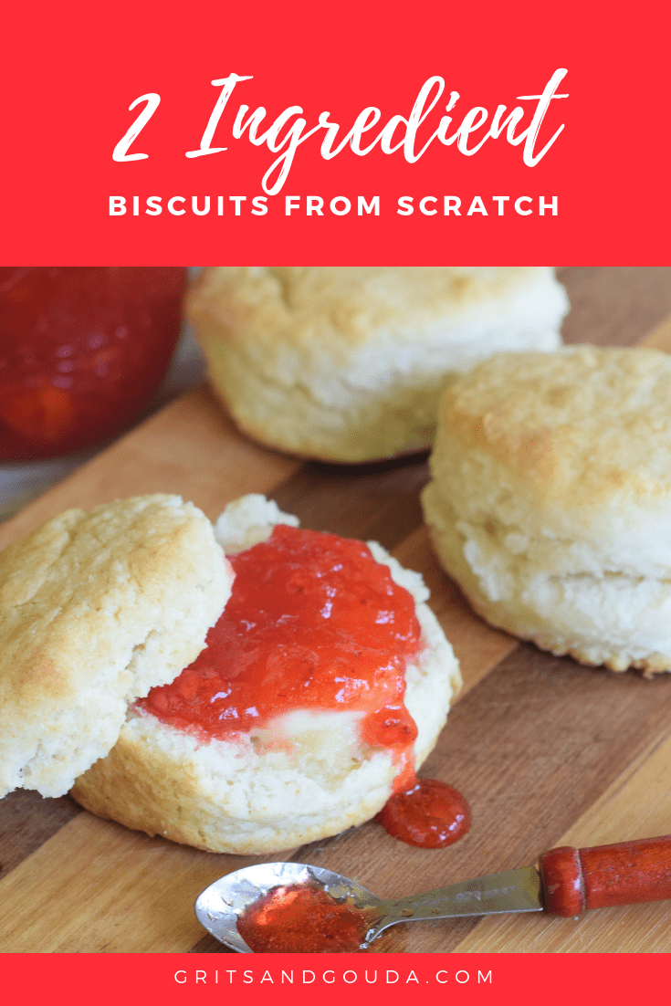 Biscuits with strawberry jam spilling over onto wooden cutting board. Text overlay.