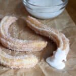 Churros with vanilla icing dipping sauce