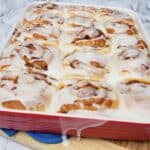 Double Stuffed Cinnamon Rolls in red baking dish