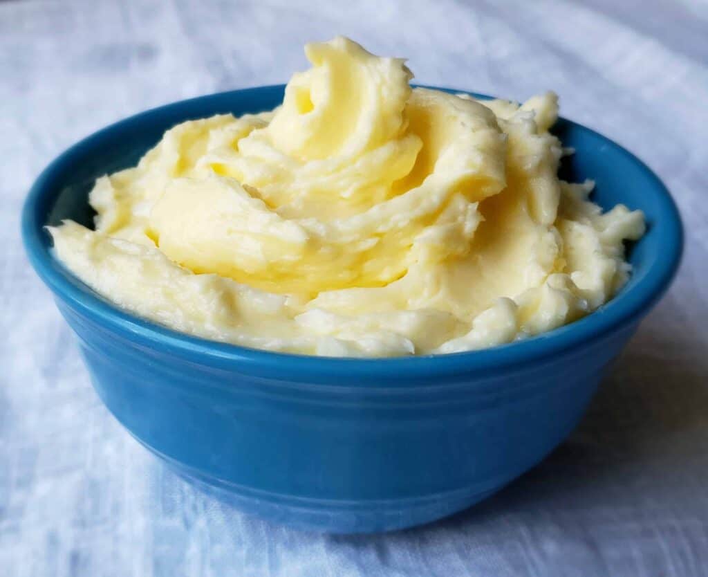 Blue bowl of homemade swirled butter