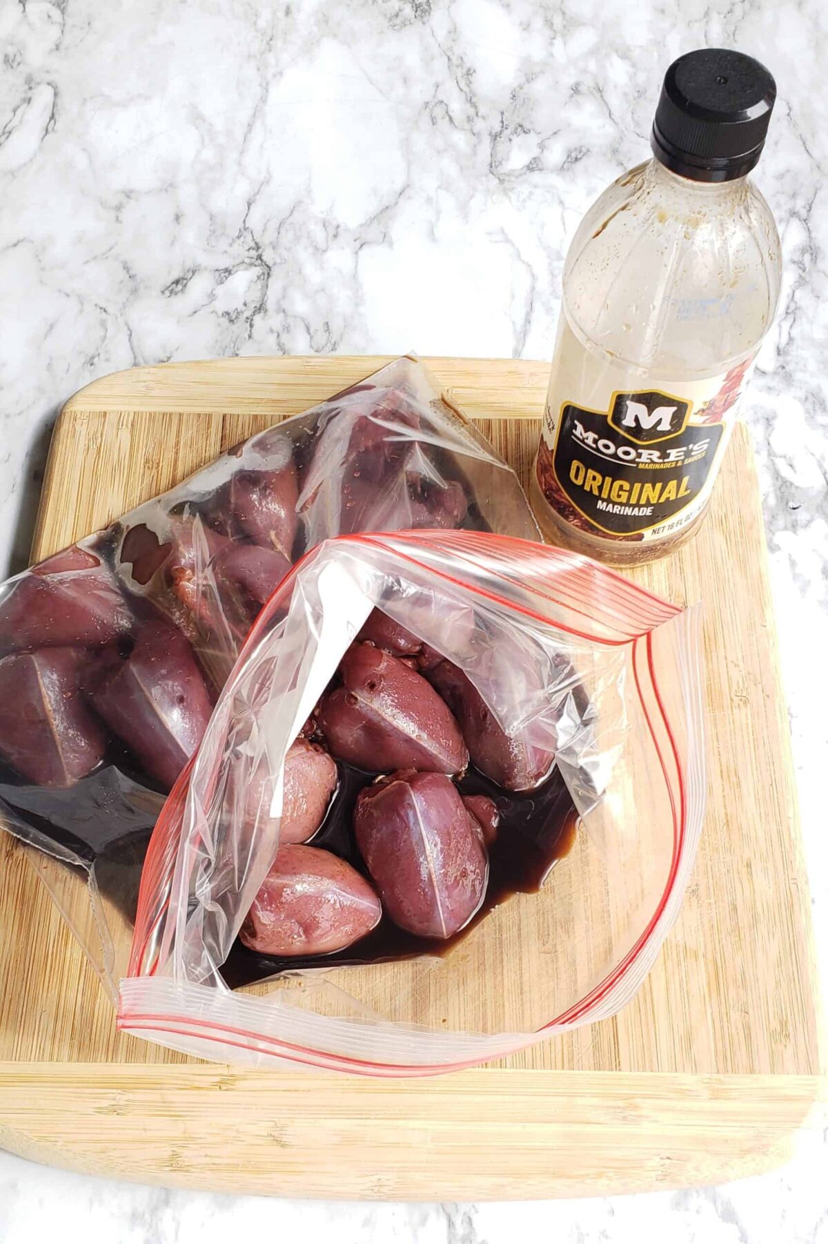 Marinating dove breasts in Moores sauce in a zip top bag