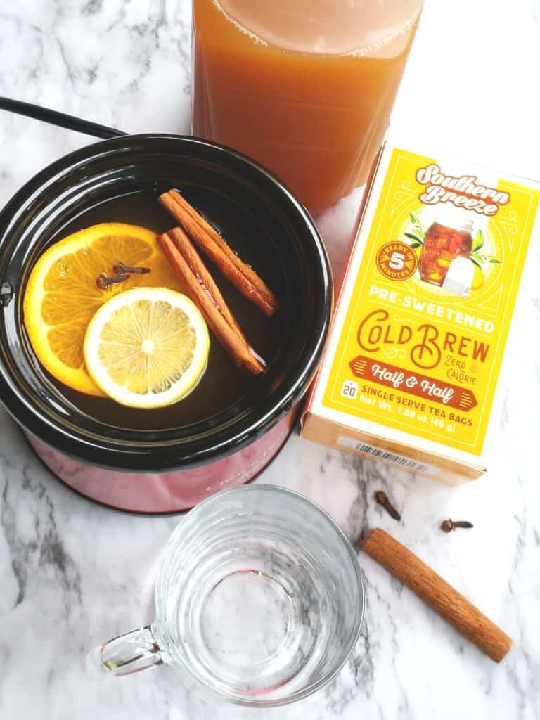 Steeping Southern Breeze Sweet Tea bags in slow cooker with mulling spices