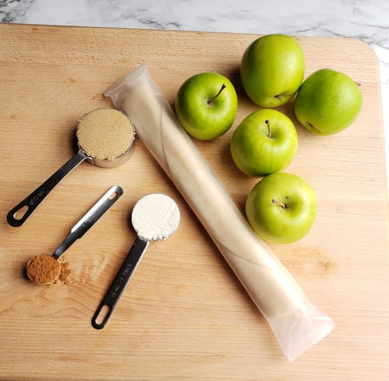 Pie crust rolled up with apples and spices