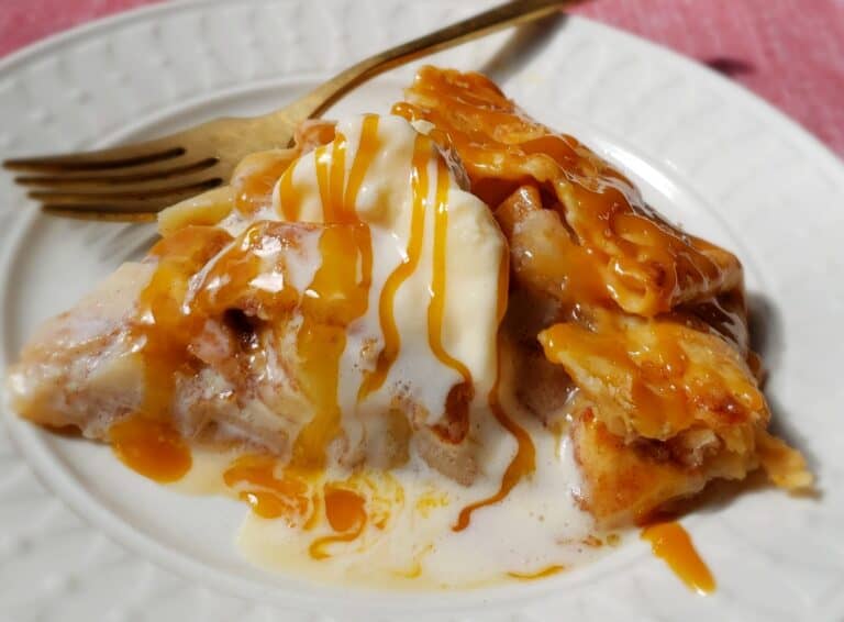 apple galette slice with ice cream on little white plate