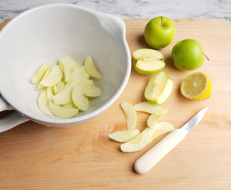 apple galette slicing apples and in bowl