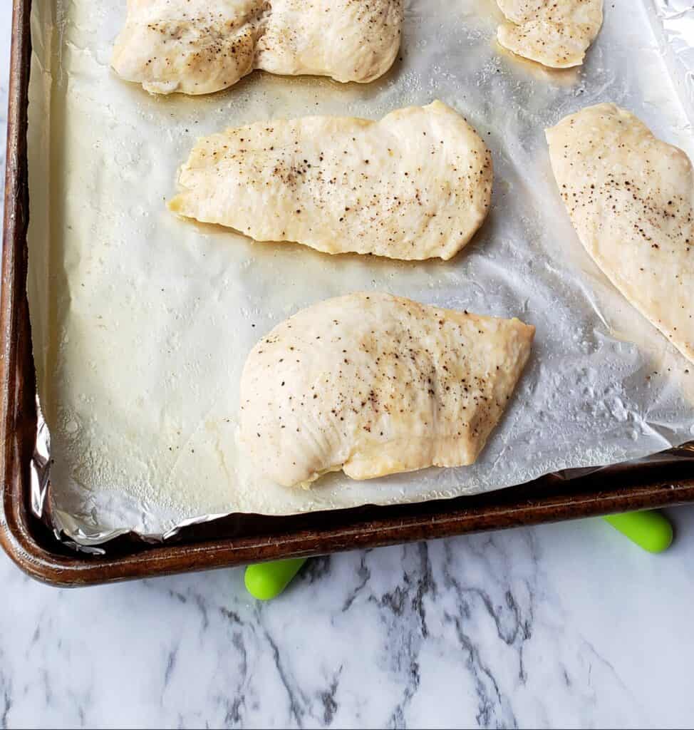 5 chicken breasts cooked on foil lined pan