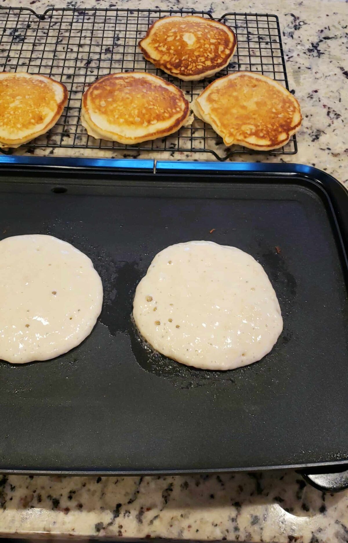 pancakes on a griddle a wire rack 