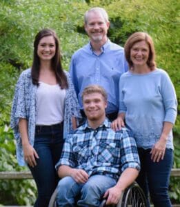 Kathleen Royal Phillips family picture 2018 trees in background