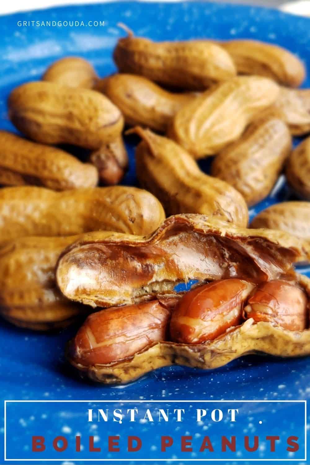 Boiled peanuts on a blue plate with one shell open with text overlay.