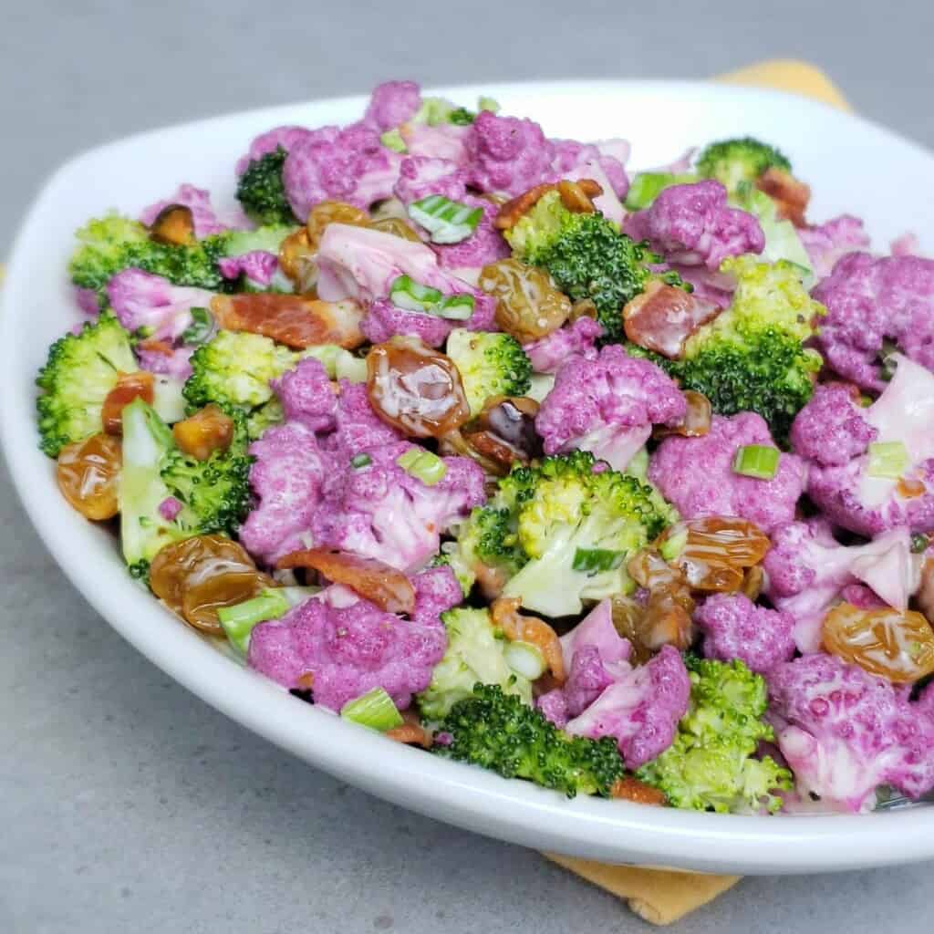 Purple Cauliflower & Broccoli Raisin Salad Grits and Gouda