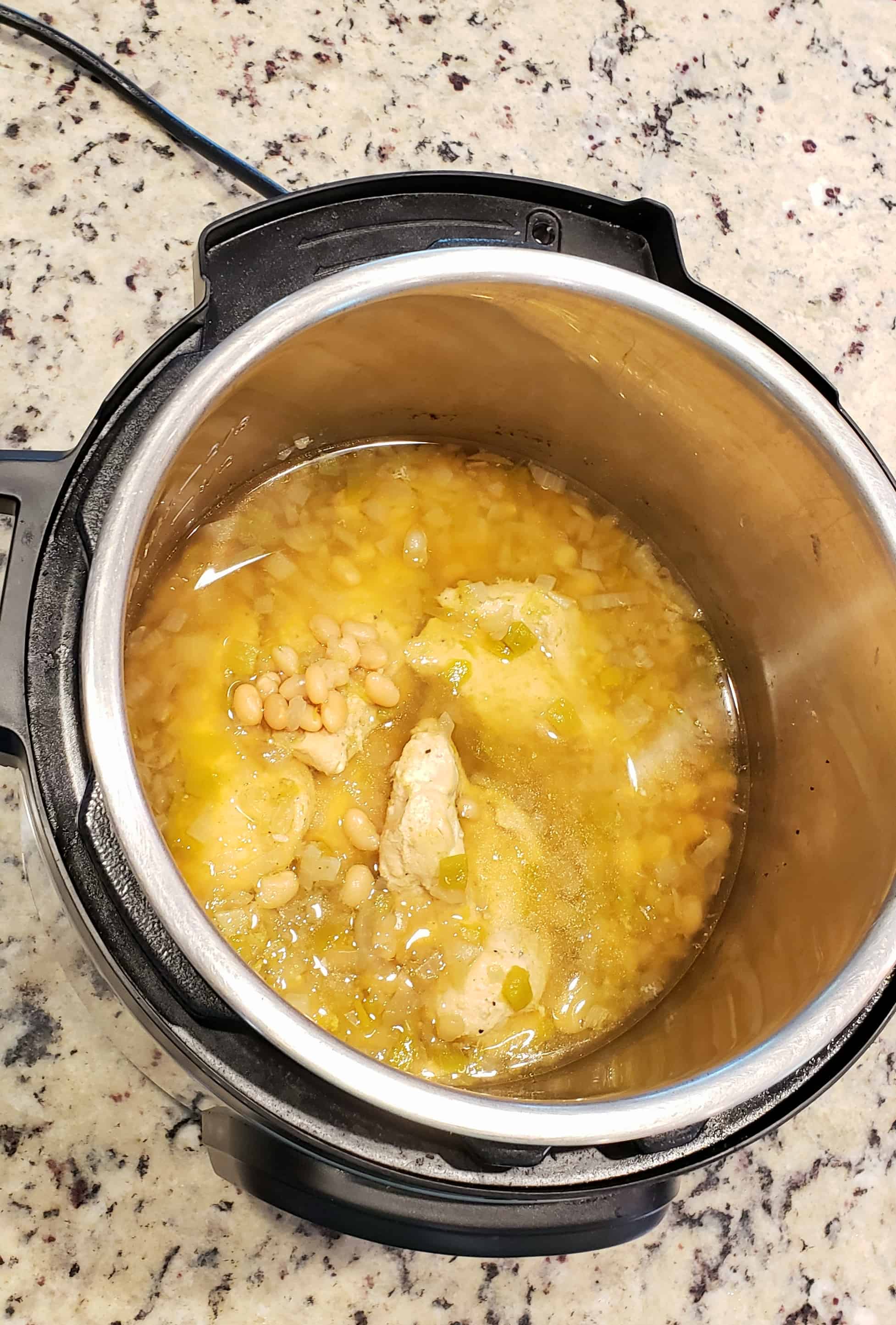 Cooked chicken and bean mixture in the Instant Pot for White Bean and Chicken Chili 