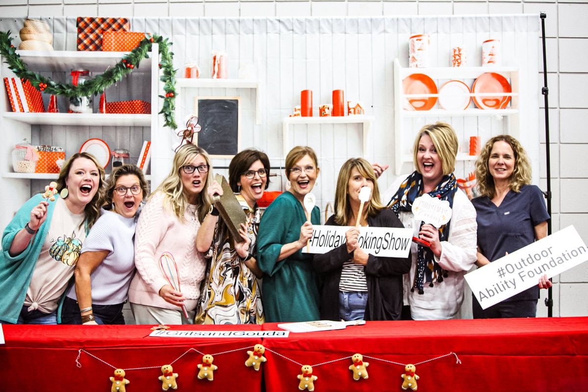 large group of Bible study group of ladies at Christmas selfie station.