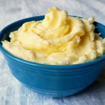 Swirled butter in a blue bowl.