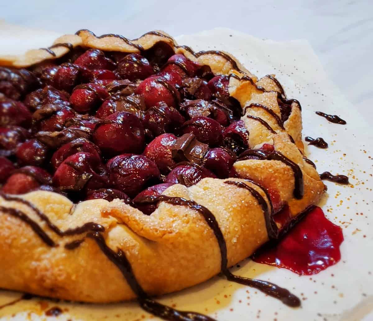 Shortcut Chocolate Cherry Pie (Galette) drizzled with chocolate