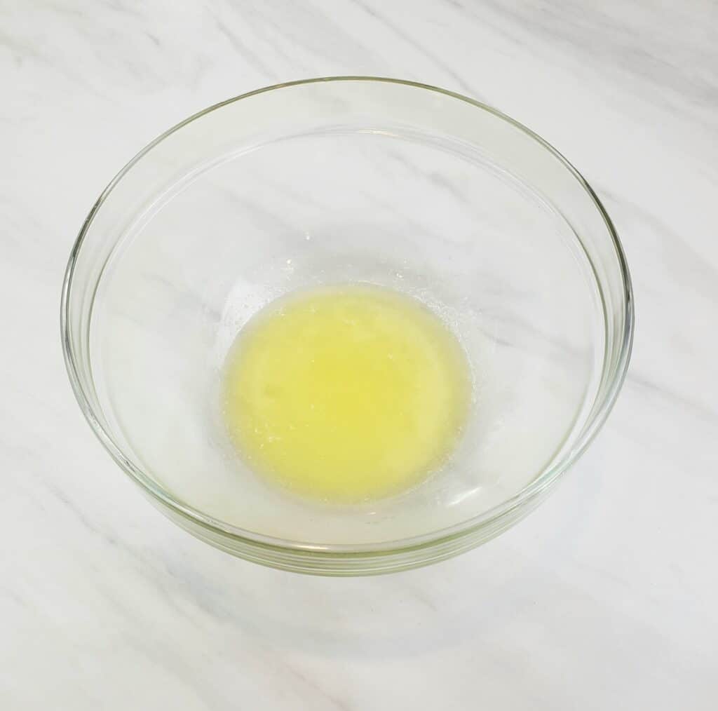 Melted butter in a glass bowl