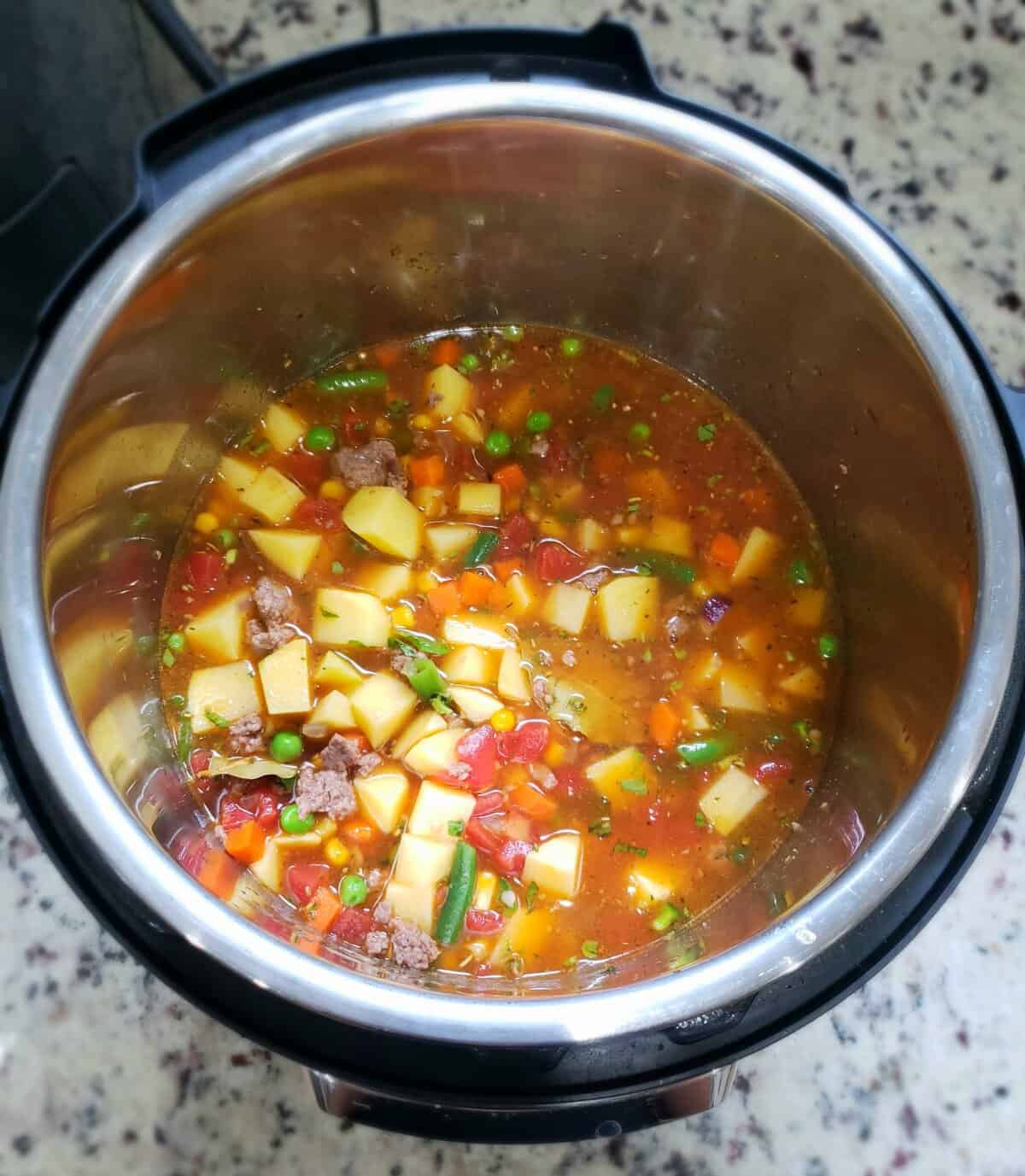 Overhead view of vegetable hamburger soup in the Instant Pot.