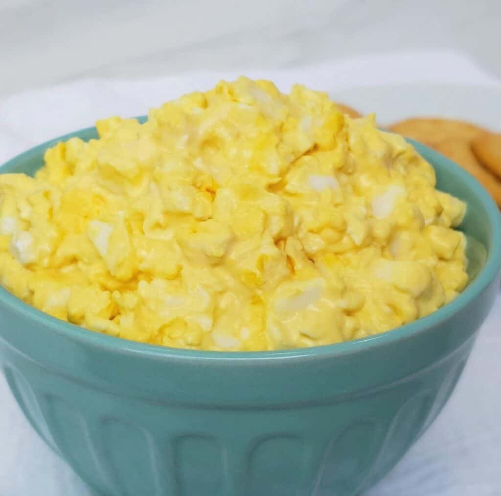 Egg salad in a turquoise bowl