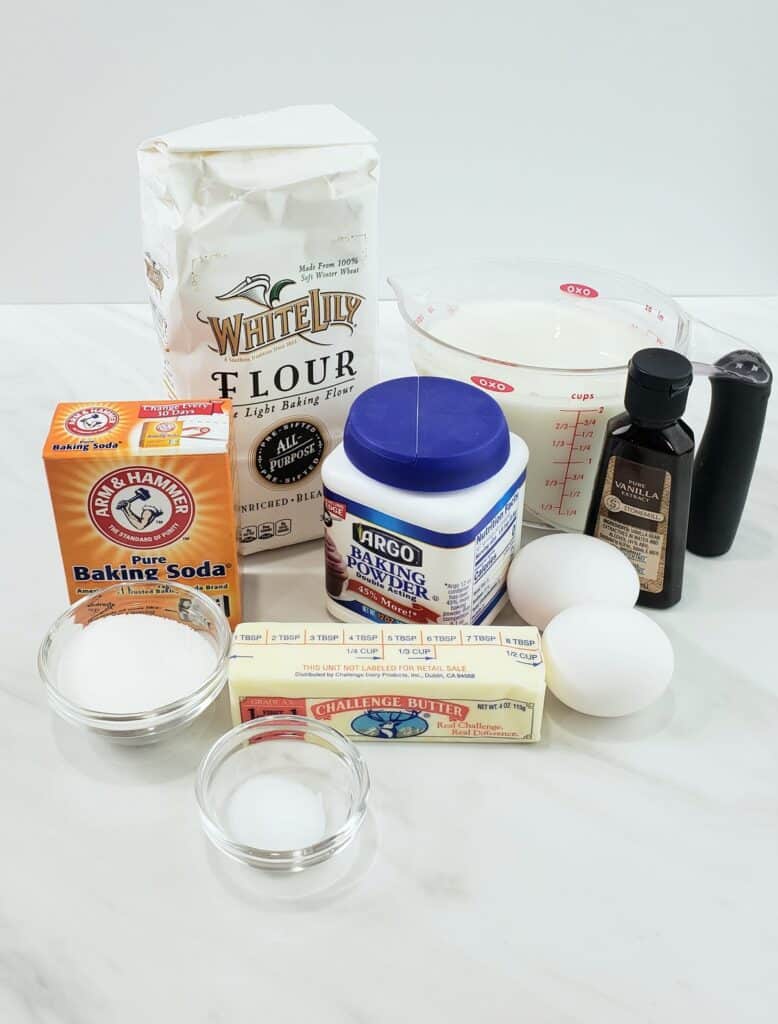 Ingredients: bag of flour, baking soda, butter, vanilla, milk in a measuring cup