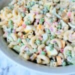 White bowl full of macaroni salad