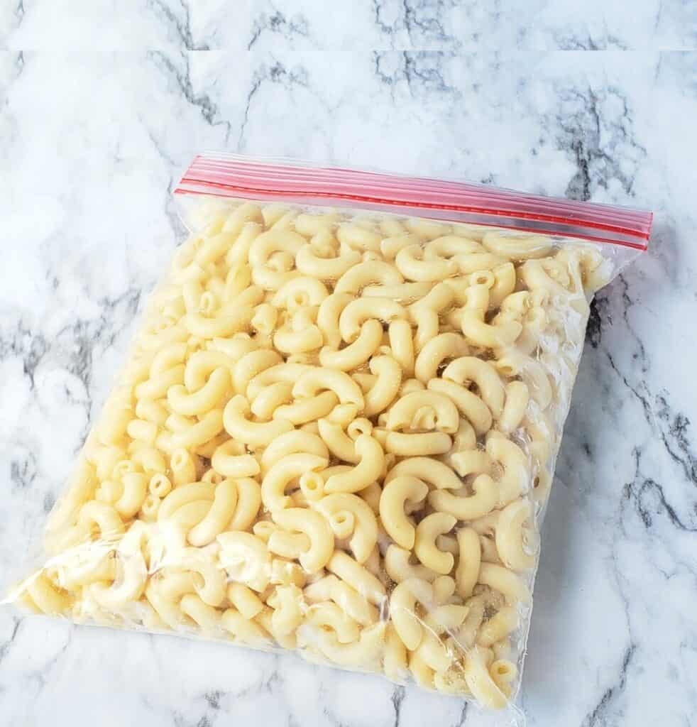 Plastic ziploc bag of cooked elbow macaroni