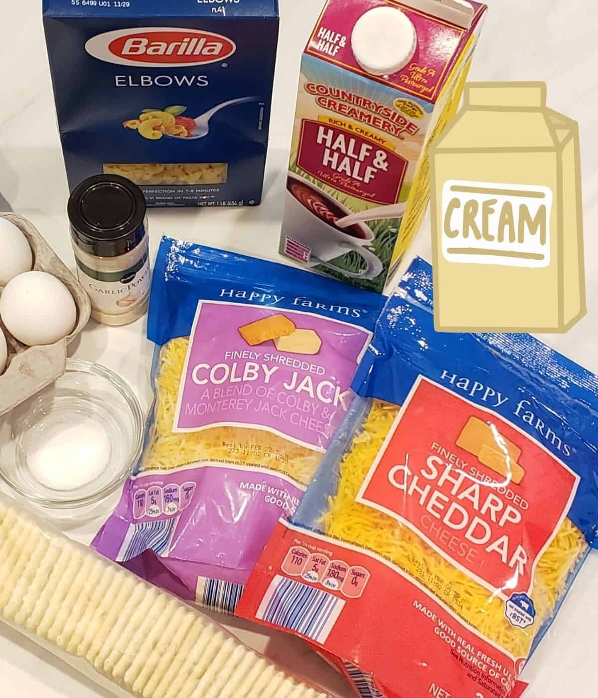 Ingredients for baked mac and cheese recipe: elbow macaroni, whipping cream, half and half, cheee, eggs