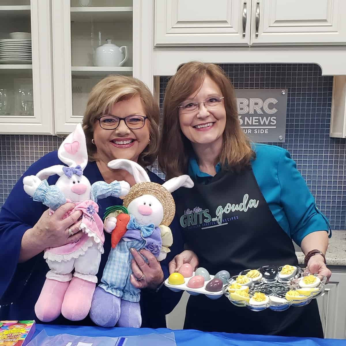 Two women in WBRC studio kitchen holding Easter eggs and Easter bunnies.