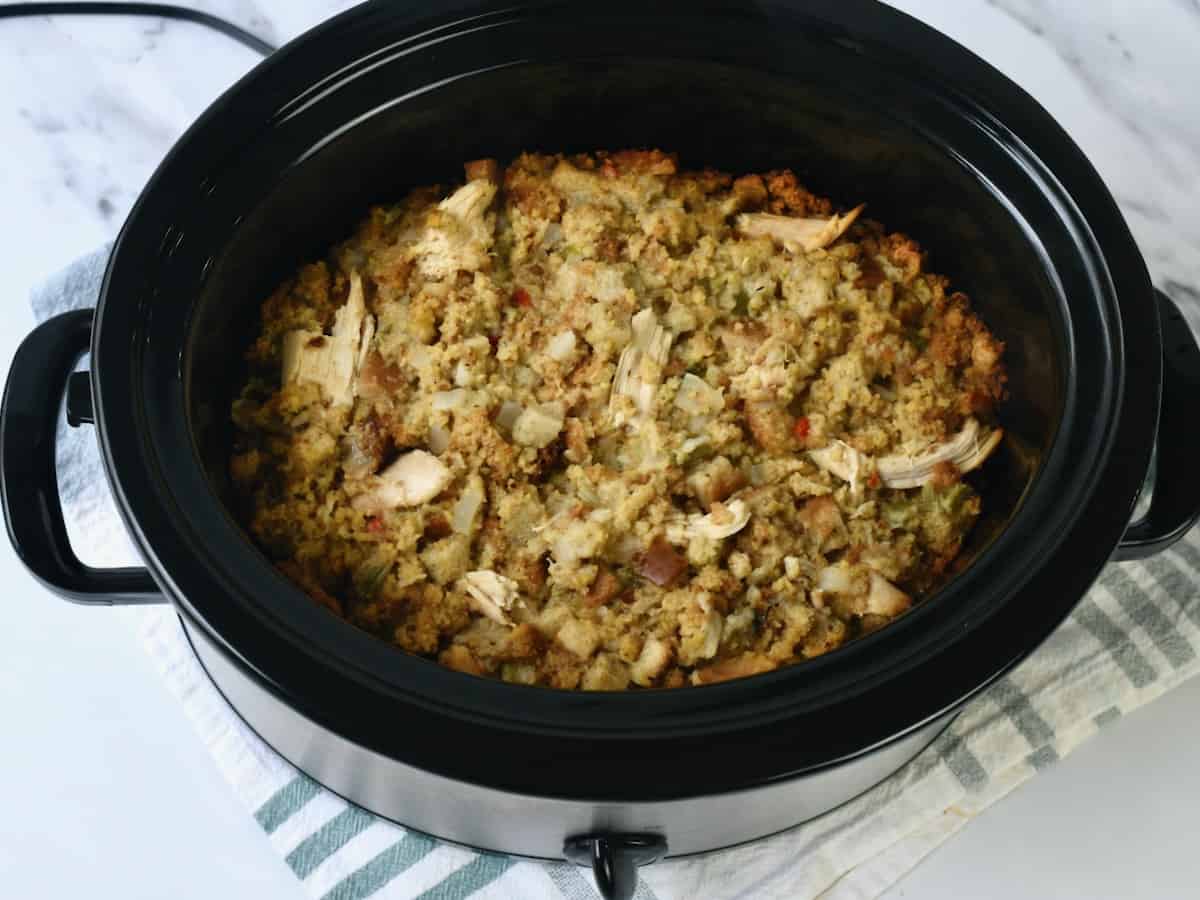 Chicken and cornbread dressing in Crockpot after cooking with lid off.