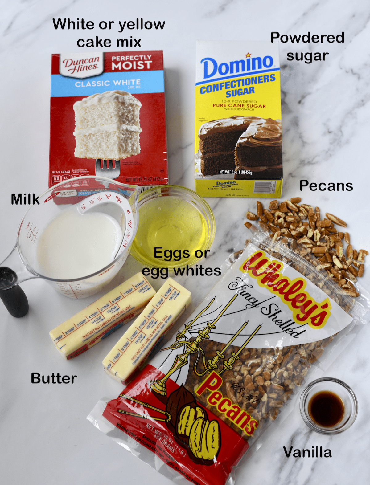 Ingredients for white Texas sheet cake recipe with cake mix.