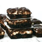 Stack of 3 Mississippi Mud Brownies made with brownie mix and canned frosting.