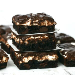 Stack of 3 Mississippi Mud Brownies made with brownie mix and canned frosting.