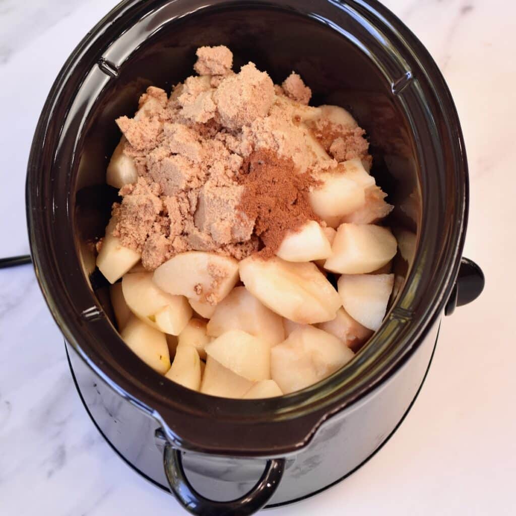 Pears and spices in a slow cooker.