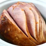 Close up of pineapple ham in a slow cooker.