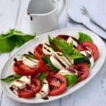 Top down view of mozzarella tomato basil salad.