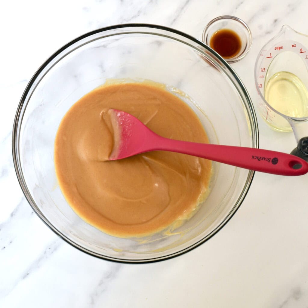 Process shot making peanut butter sheet cake.