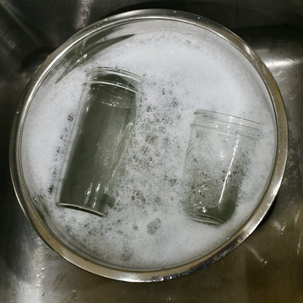 Canning jars in soapy water.