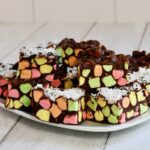 cathedral church window bars with colorful mini marshmallows stacked on a plate