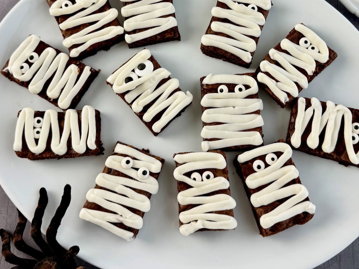 Platter of halloween treats mummy brownies.