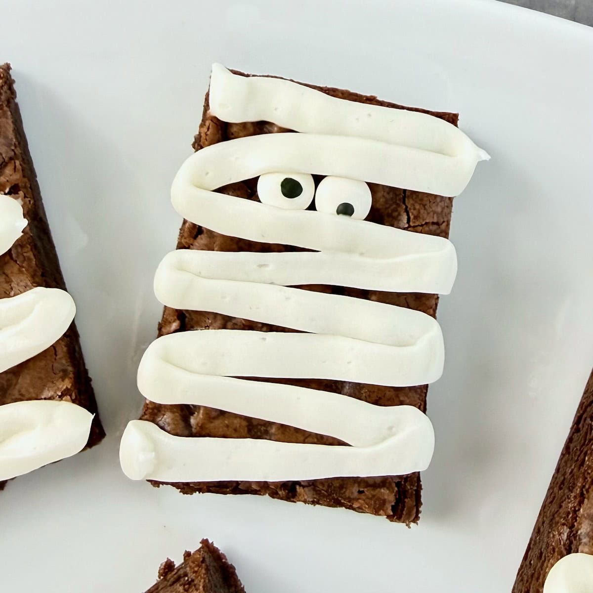 Decorated halloween brownies as mummy brownie.