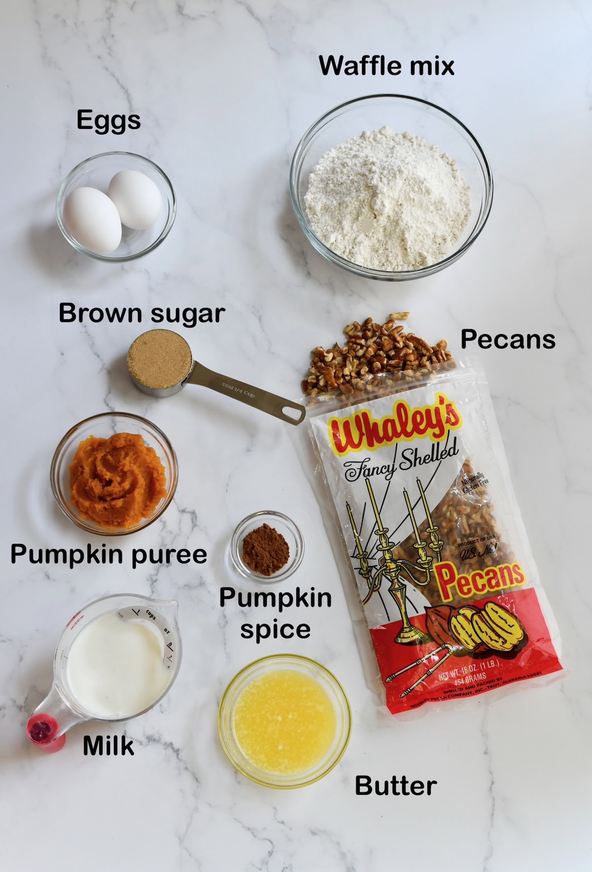 Ingredients for Pecan Pumpkin Waffles: waffle mix, pecans, pumpkin puree, butter, eggs
