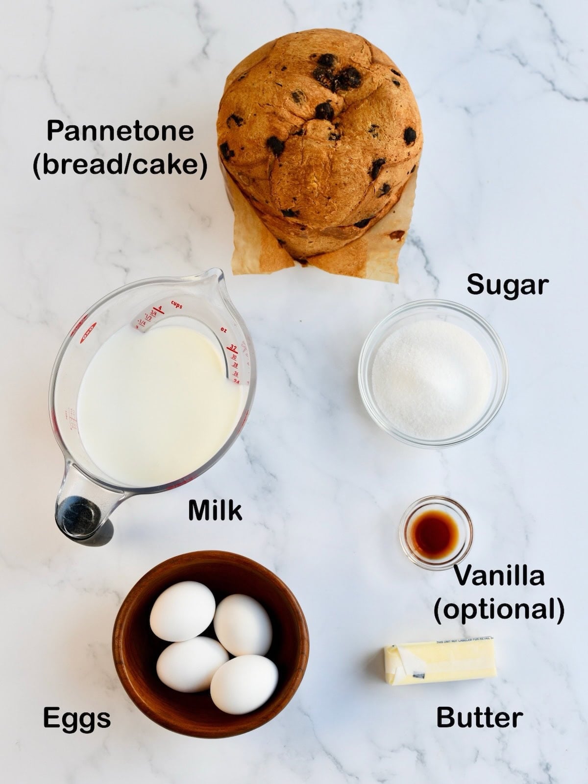 Overhead shot of ingredients needed to make panettone bread pudding.