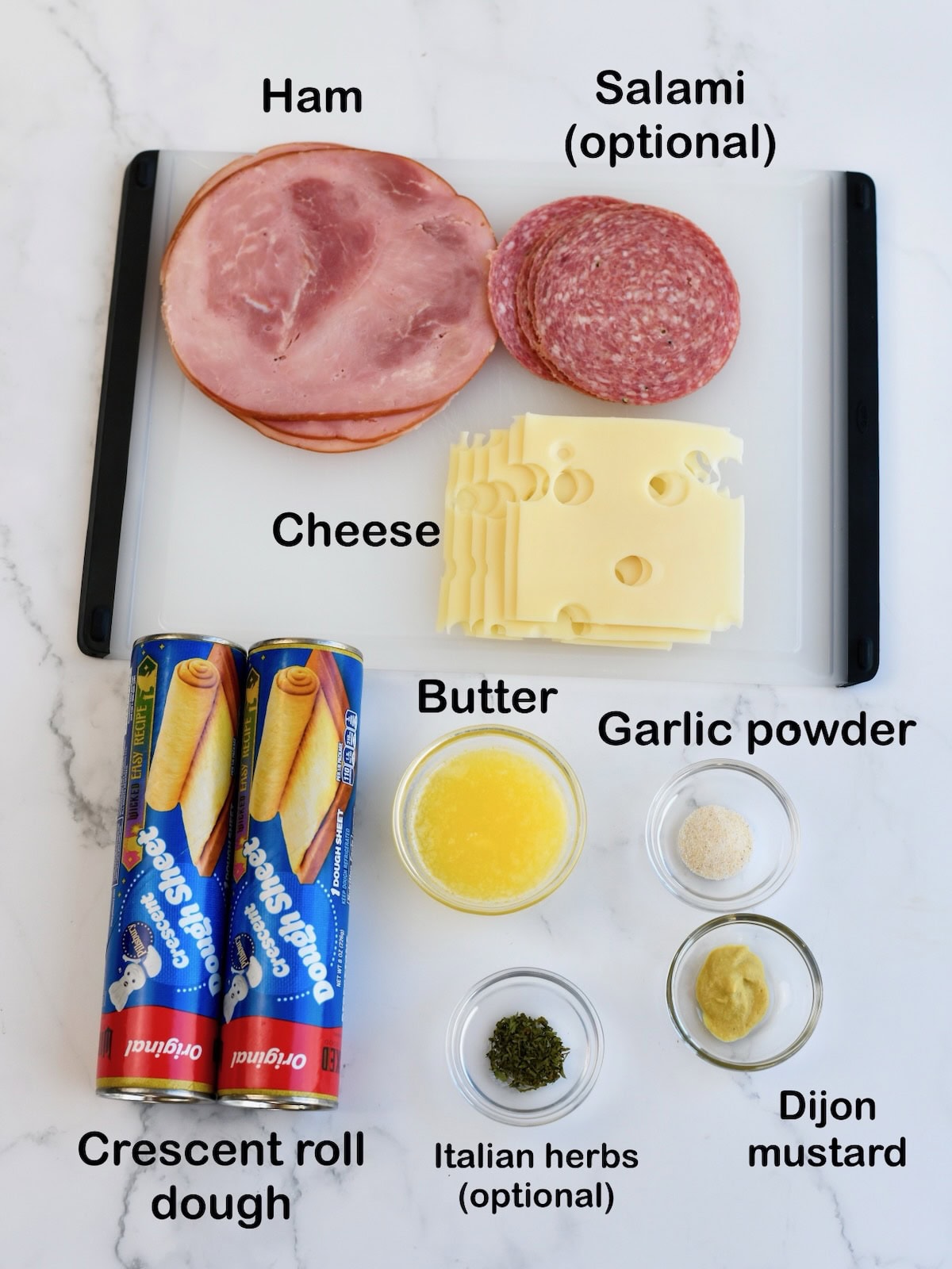 Ingredients needed to make ham and cheese crescent roll bake.