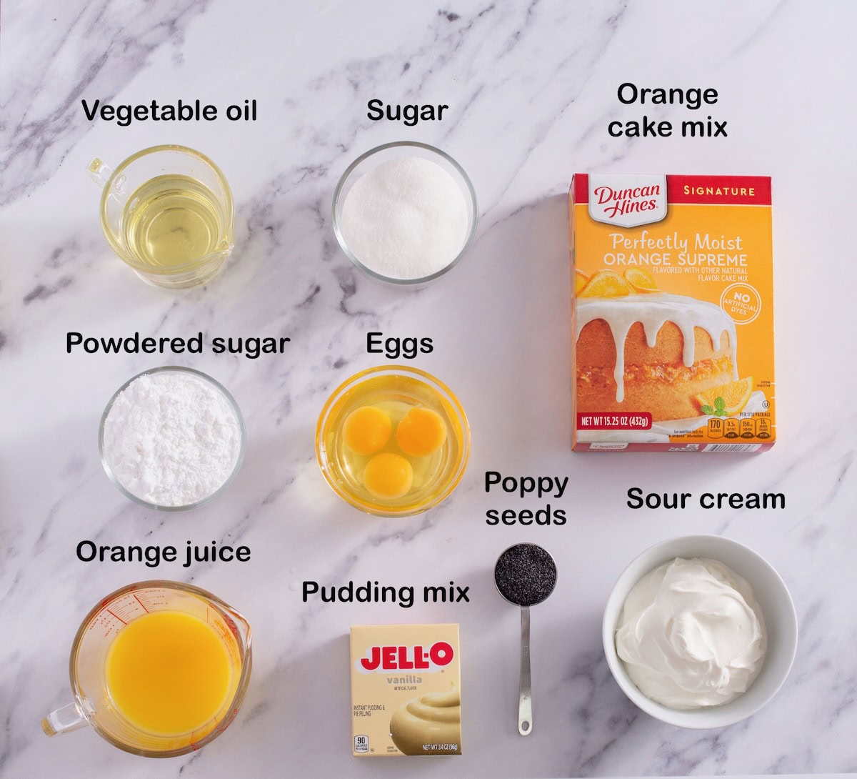 Ingredients for orange poppy seed cake.