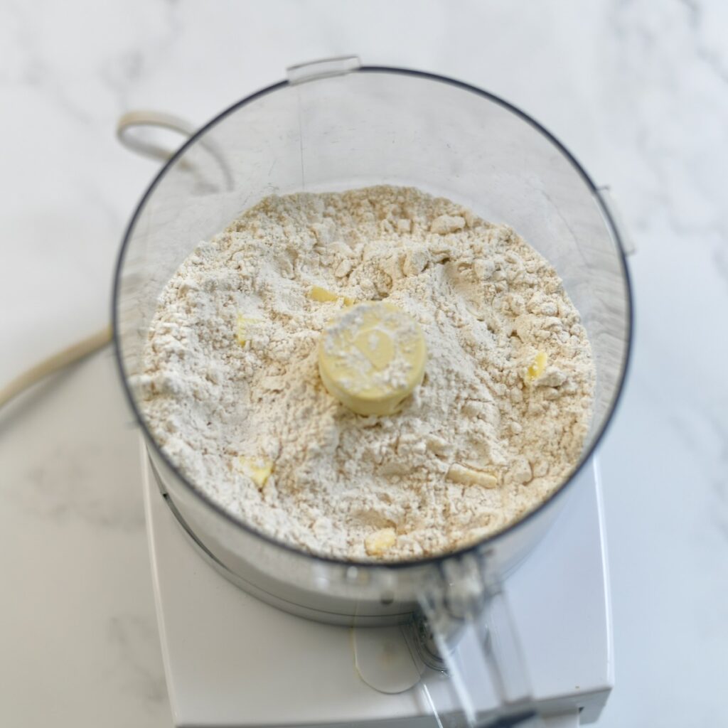 Flour and butter in a food processor.